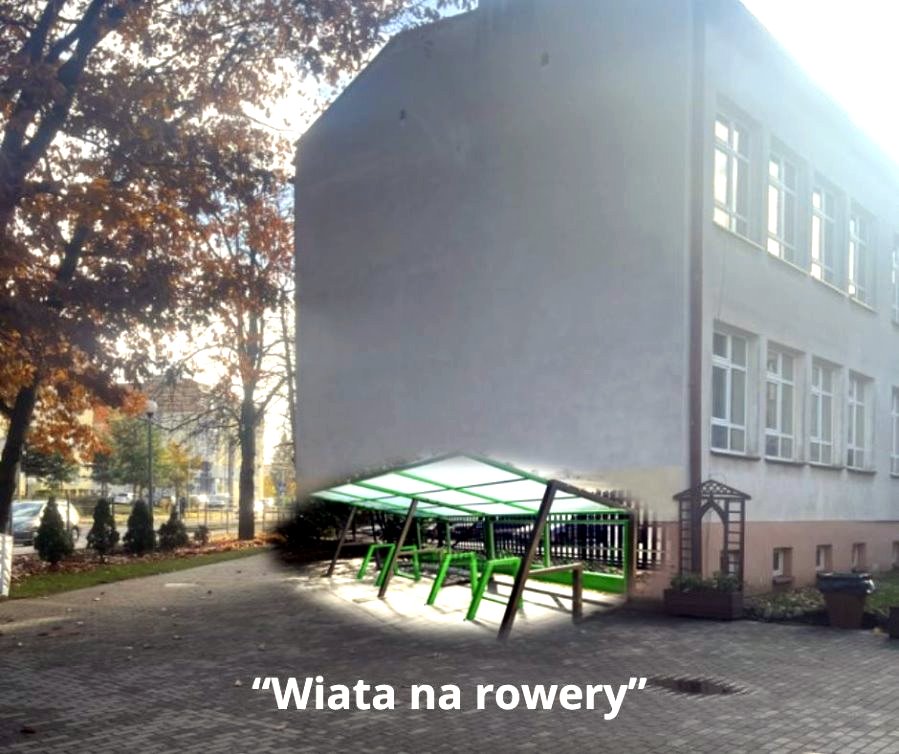 Widok na budynek szkoły i nazwa projektu